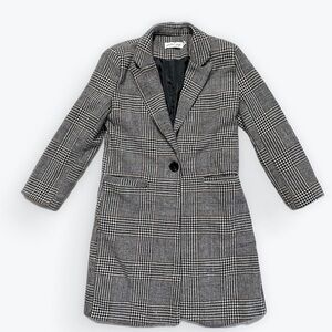 Elegant Black and White Checkered Blazer. 80% good.